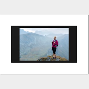 Woman backpacker hiking on a trail Posters and Art